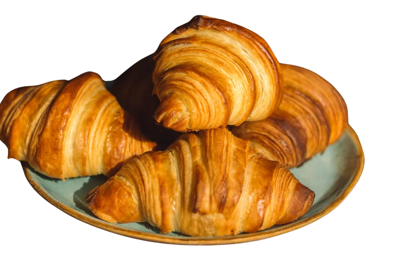 Croissants sobre um prato. Imagem ilustrativa.